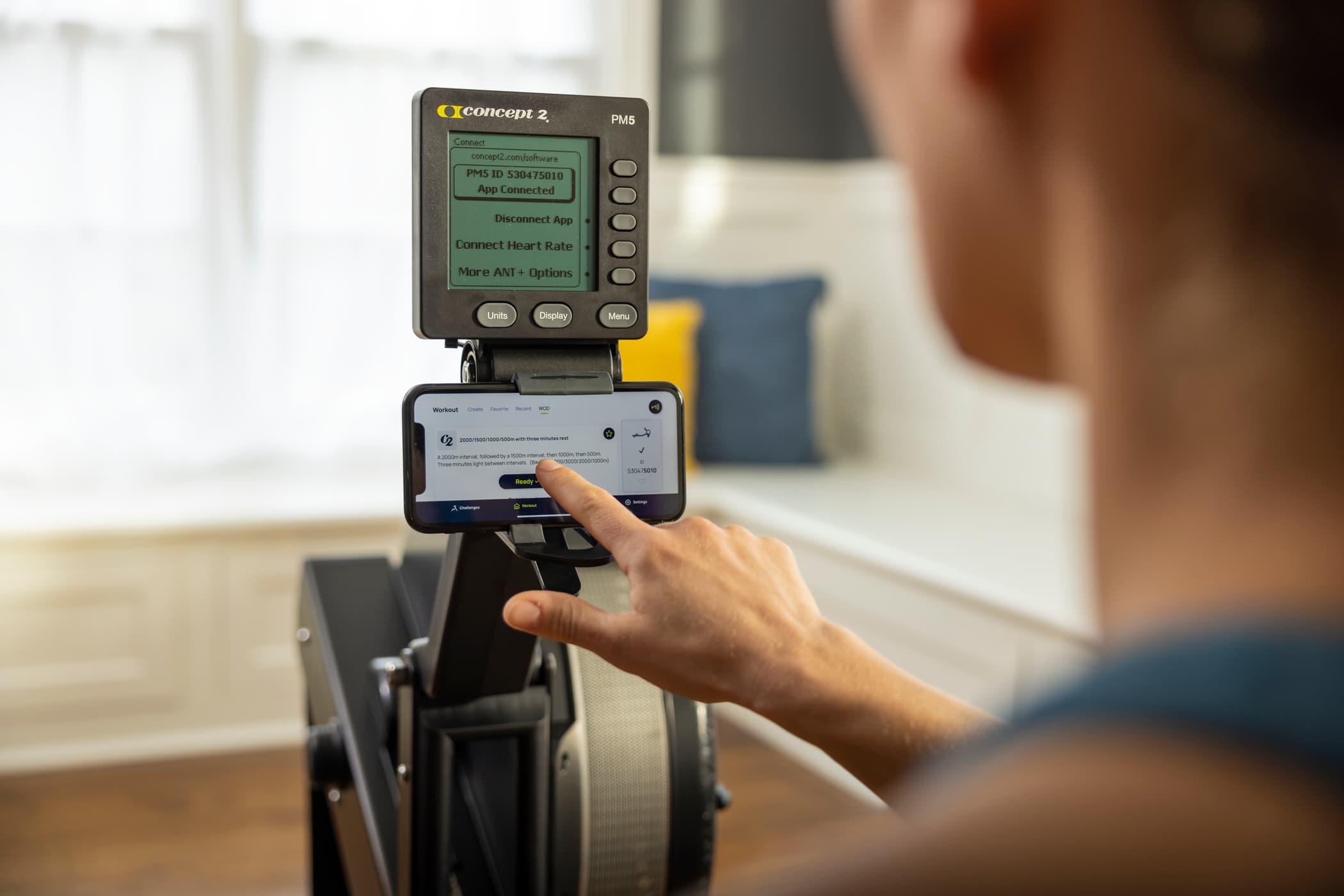 Woman on RowErg using ErgData